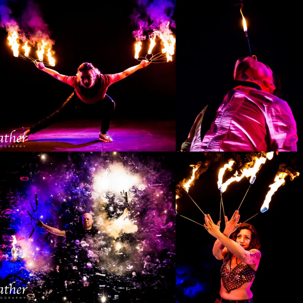 Diverse group of fire performers celebrating together